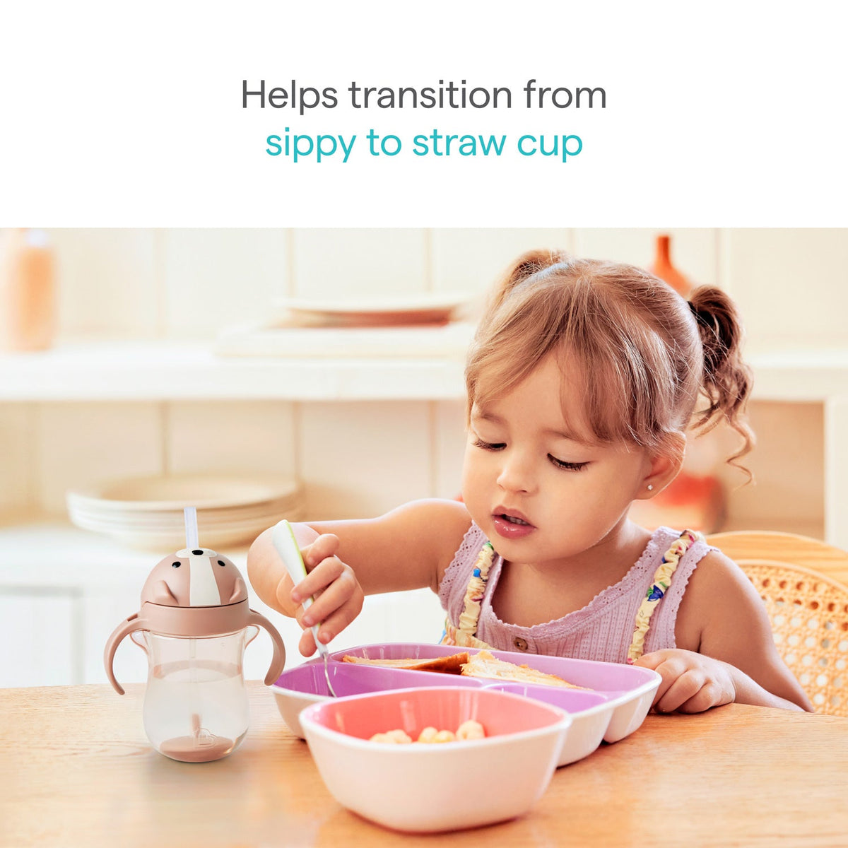Child using a sippy cup with text indicating it helps transition from sippy to straw cup.
