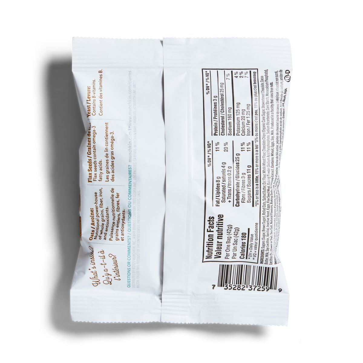 Close-up of a white snack package with text and a nutrition label on a white background
