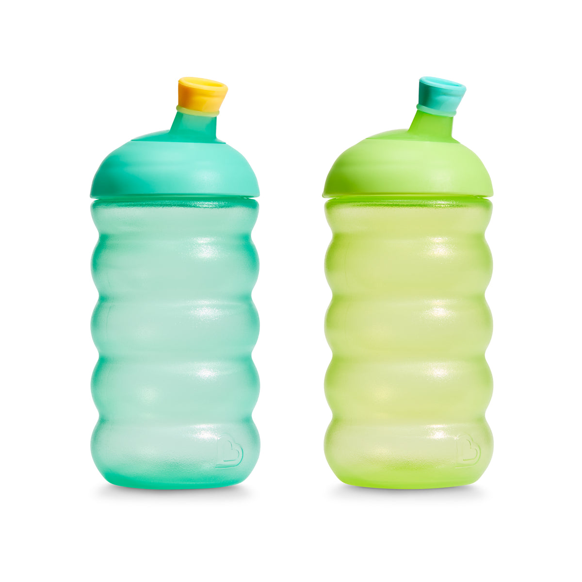 Two green sippy cups with colorful lids on a white background