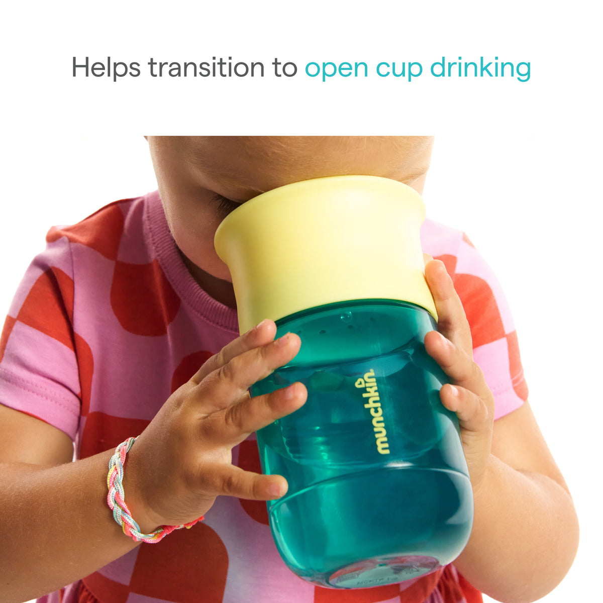 Child holding a blue and yellow sippy cup with text indicating it helps transition to open cup drinking.