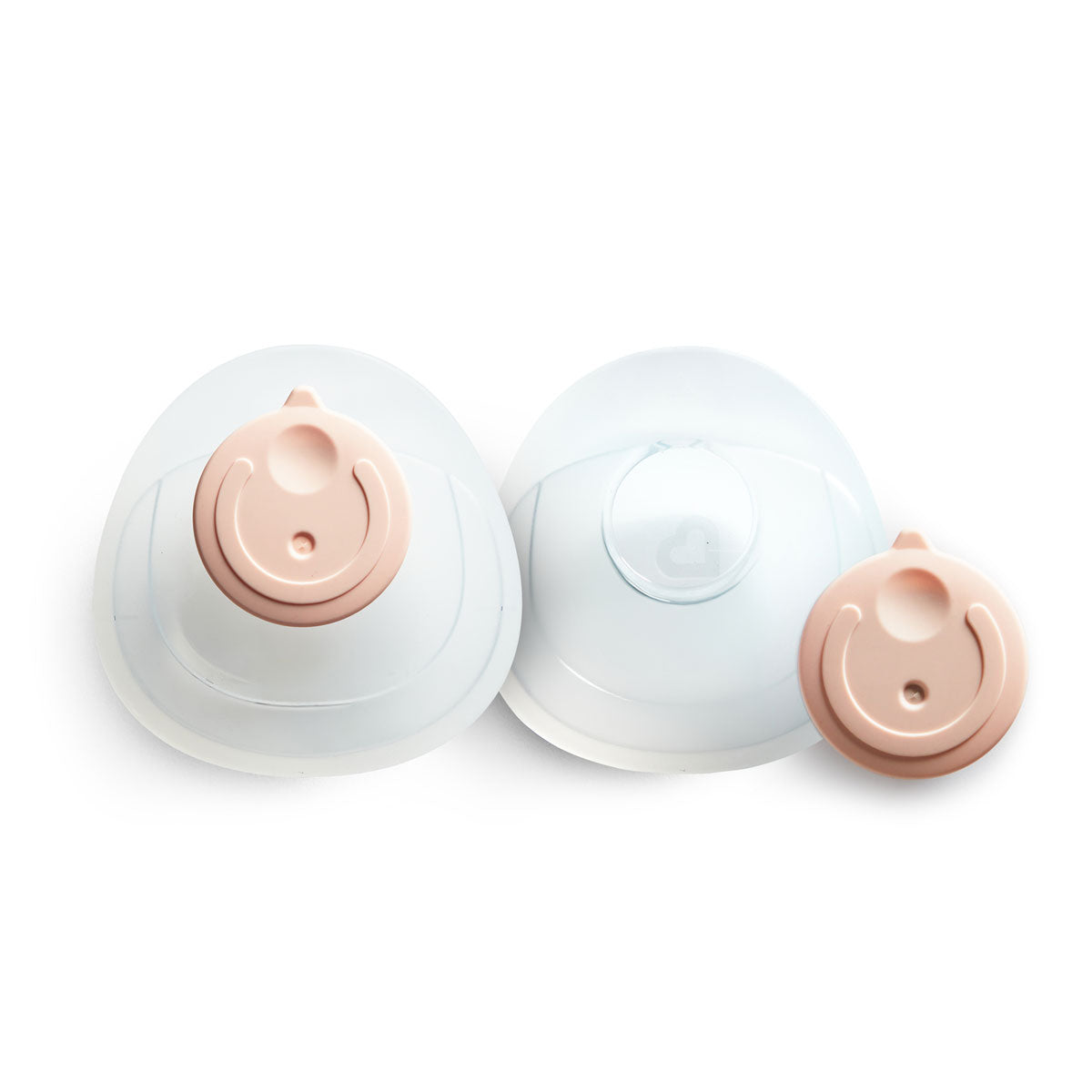 Two white silicone breast pump flanges with blush-colored valves, shown in different sizes on a white background.