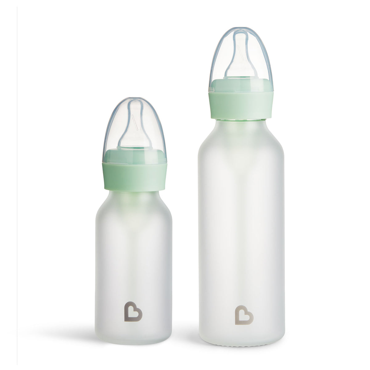 Two Munchkin frosted glass baby bottles in small and large sizes with mint green collars and silicone nipples, shown side by side on a white background.