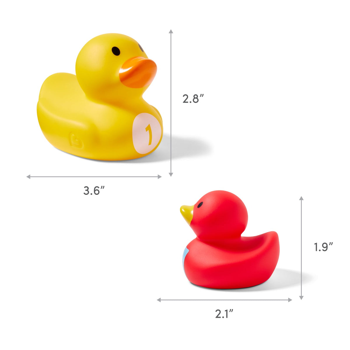 A Munchkin Count Quack Bath Duckies set features a yellow duck labeled “1” 3.6" L x 2.8" H beside a smaller red duck 2.1" L x 1.9" H, with measurement arrows indicating their sizes.