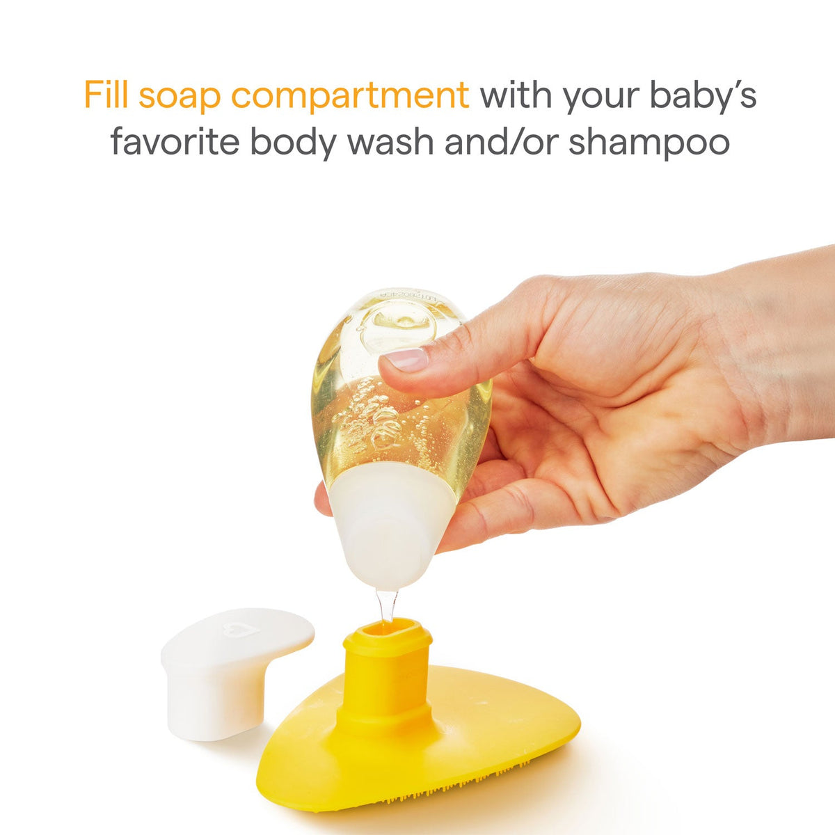 Hand filling a yellow soap compartment with liquid, with text on how to use it.