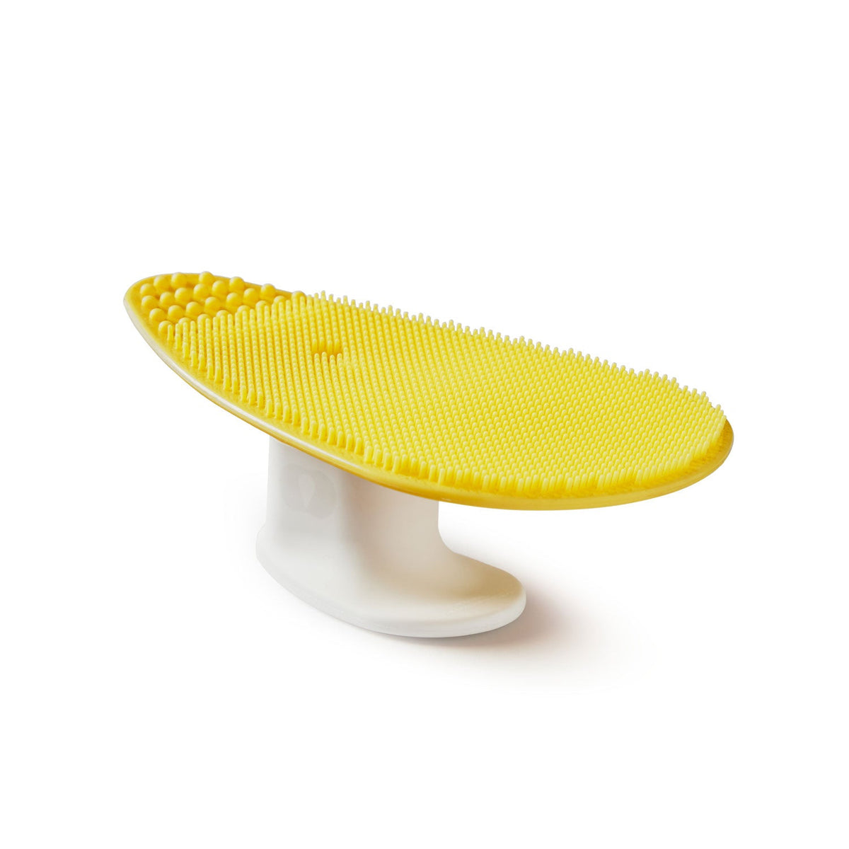 Yellow balance board with textured surface on a white background