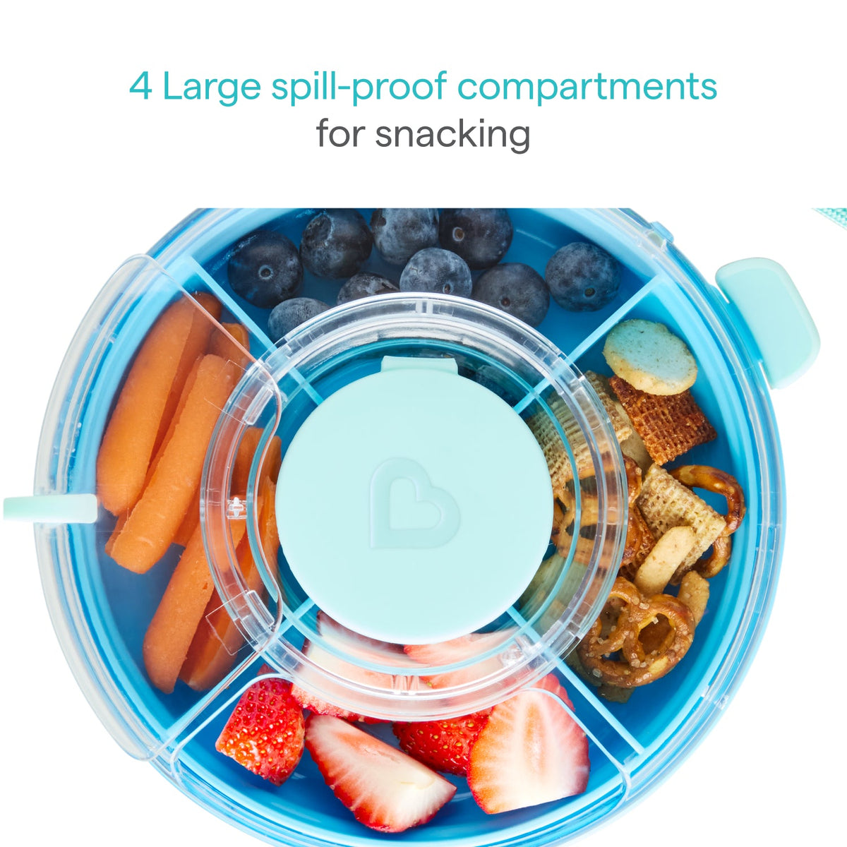 Blue snack container with compartments filled with fruits and snacks on a white background